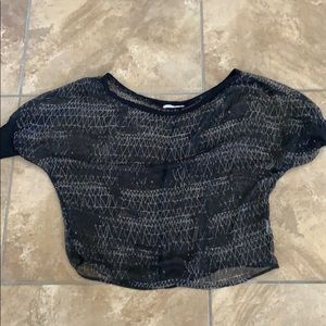 Black sheer shirt with gold/tan patterned design